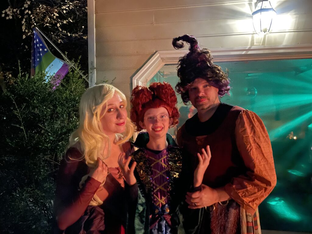 Three people dressed up like the witches from Hocus Pocus